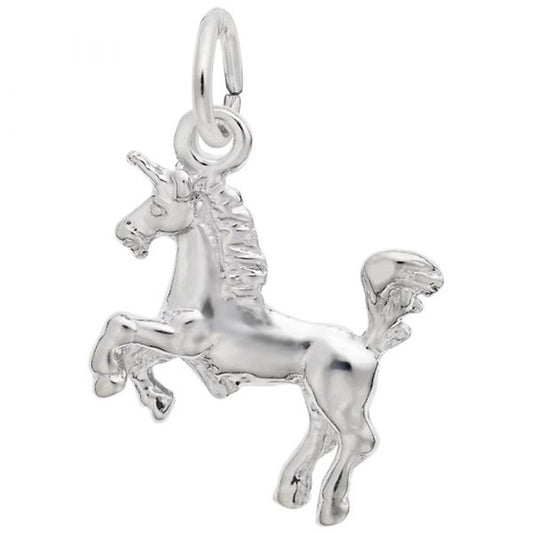 The Unicorn Charm / Sterling Silver from Rembrandt Charms boasts a shiny, silver-toned finish and features a raised front leg, detailed mane, and tail. This sterling silver charm includes a small circular loop at the top for easy attachment to a bracelet or necklace, capturing the mythical creature in a rearing pose.