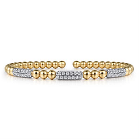 The Gabriel & Co 14K White and Yellow Gold Diamond Pave Three Station Bar Bracelet features two rows of smooth gold beads. Each end is adorned with a rectangular section of pave-set diamonds, adding sparkle. The open-ended design showcases its elegant and modern aesthetic, making it a stunning diamond bracelet.