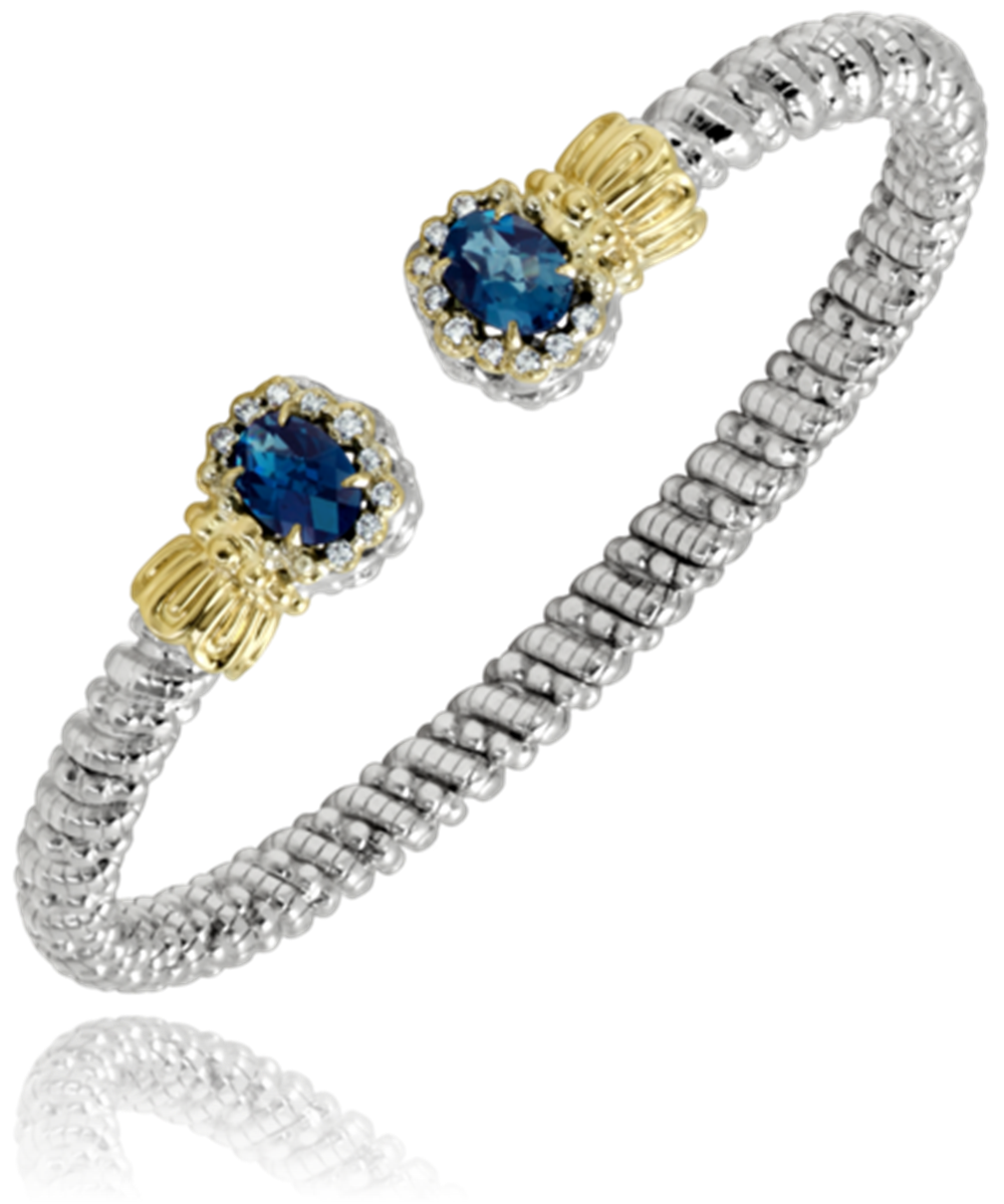 Alwand Vahan Jewelry presents the "4mm London Blue," a silver beaded bracelet adorned with 4mm London blue gemstone ends accentuated by gold highlights. This bracelet features an open-ended, textured design.