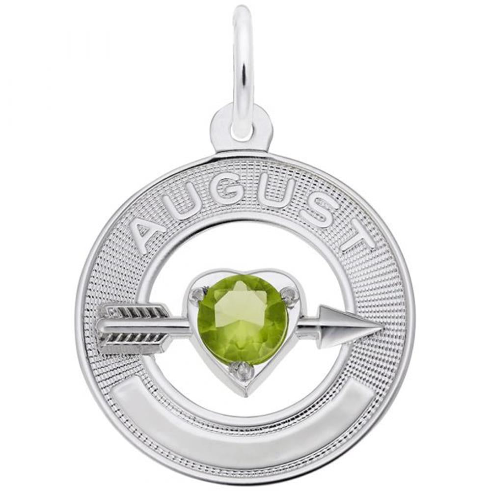 A circular silver pendant with the word "August" engraved at the top. At the center is a heart-shaped green peridot, representing the month's birthstone. An arrow runs through the gemstone horizontally. This August Love Birthstone Charm / Sterling Silver from Rembrandt Charms also features a small loop for a chain.