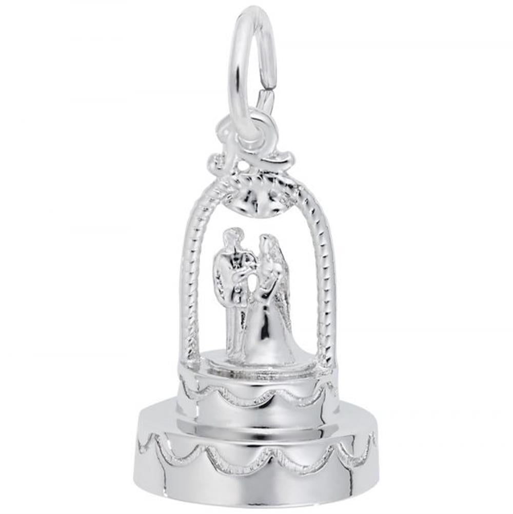 The Wedding Cake Charm by Rembrandt Charms is a small sterling silver charm that depicts a bride and groom under an arch, reminiscent of a wedding cake topper. This intricate piece features a circular base with a scalloped edge and includes a loop at the top for easy attachment to a bracelet or necklace. The charm's detailed design beautifully captures the figures' clothing and wedding scene elements.