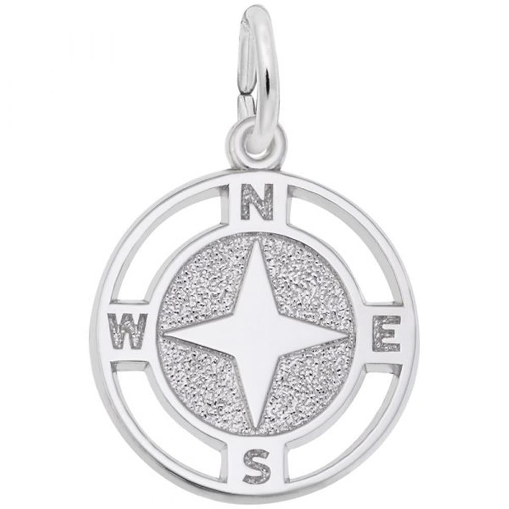 The Rembrandt Charms Nautical Compass Charm, made from sterling silver, has a textured background featuring the cardinal directions N, E, S, and W. It boasts a smooth, polished finish and comes with an attached loop for easy wear on a chain.