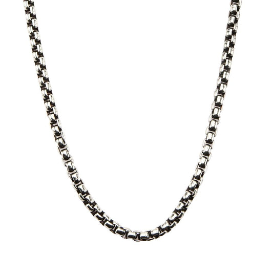 A close-up image of the Men's Stainless Steel Black Oxidized Bold Box Chain by INOX against a white background. The chain, designed for men, features square-shaped links and appears slightly curved at the bottom.