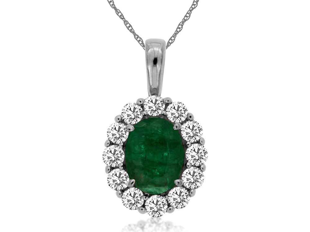 A vivid peridot pendant, similar to this Royal Jewelry 14k YG Peridot and Diamond ring, is accented by a halo of round diamonds on a silver chain.