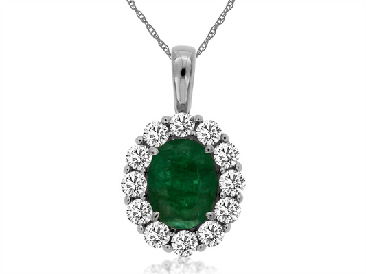 A vivid peridot pendant, similar to this Royal Jewelry 14k YG Peridot and Diamond ring, is accented by a halo of round diamonds on a silver chain.