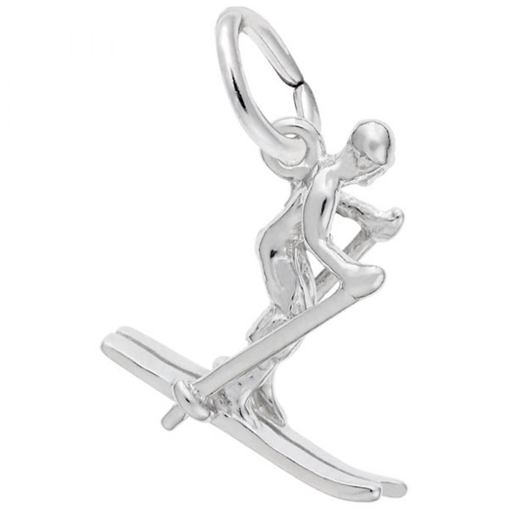 The Rembrandt Charms Skier Charm in Sterling Silver showcases a detailed figure of a skier in motion, depicted in a crouched position with bent knees, holding ski poles, and standing on skis. It includes a small loop at the top for easy attachment to a bracelet or necklace.