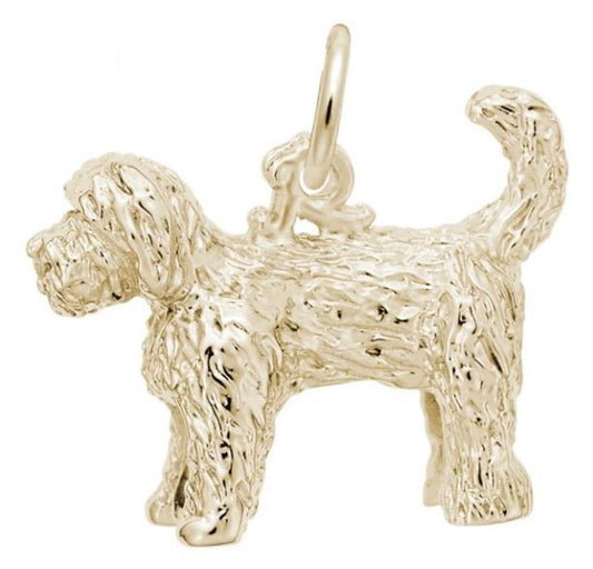 The Goldendoodle Dog Charm from Rembrandt Charms is a gold-plated sterling silver pendant featuring a textured, shaggy-haired Goldendoodle with a curled tail, standing on all four legs. It includes a loop at the top for easy attachment to a chain or bracelet.