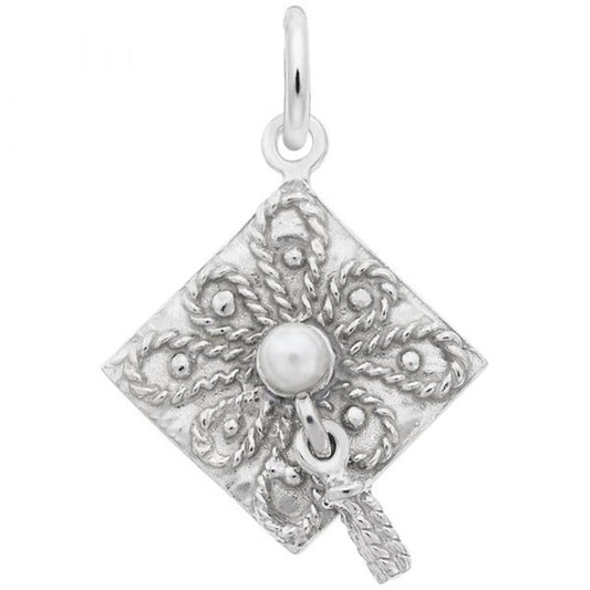 The Graduation Cap With Pearl Charm by Rembrandt Charms is crafted from sterling silver and features exquisite filigree patterns with a central pearl detail. This elegant charm includes a circular loop at the top, making it easy to attach to a chain or bracelet.