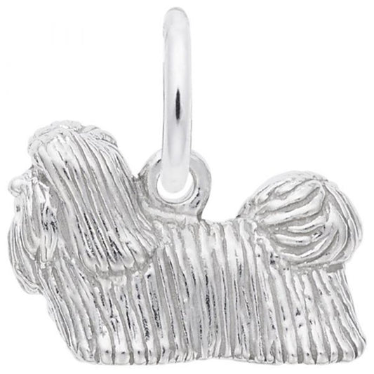 The Shih Tzu Dog Charm in Sterling Silver by Rembrandt Charms beautifully captures the essence of a long-haired dog with its detailed fur texture and smooth loop for easy attachment, making it an ideal addition to any dog lover's collection.