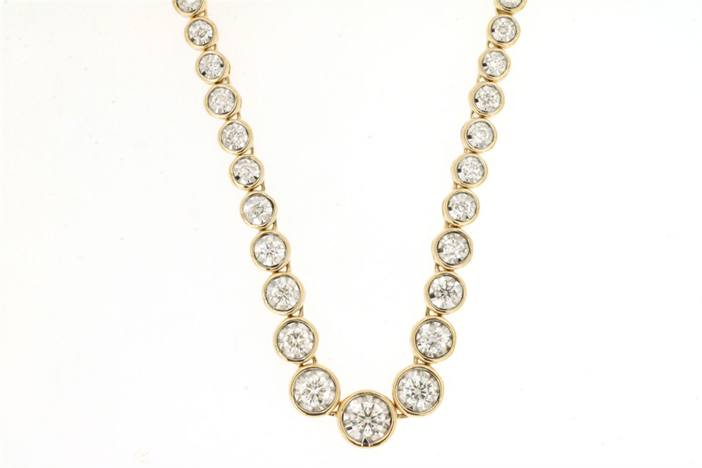 The Royal Jewelry 14k YG diamond necklace, style #C9880D, showcases 1.5 carat round bezel-set diamonds in a stunning V-shape pattern against a white background.