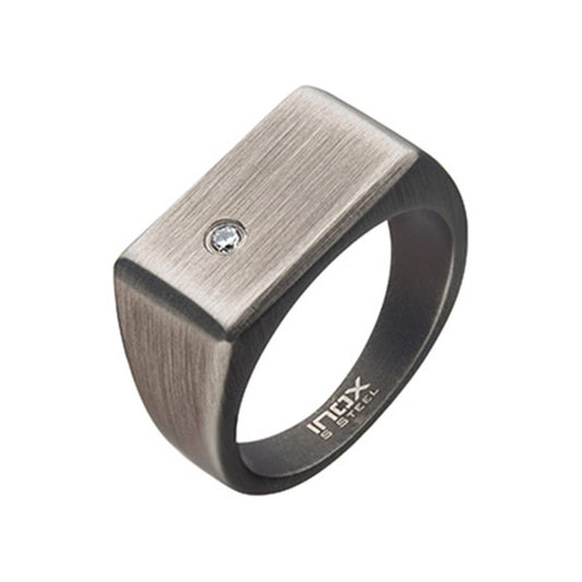 A sleek, rectangular-shaped men's stainless steel ring with a matte finish from INOX. This Men's Stainless Steel with 2mm Clear CZ Signet Ring features a single small diamond set off-center on the broad, flat top surface. The inner band is engraved with the text "Inex S Steel.