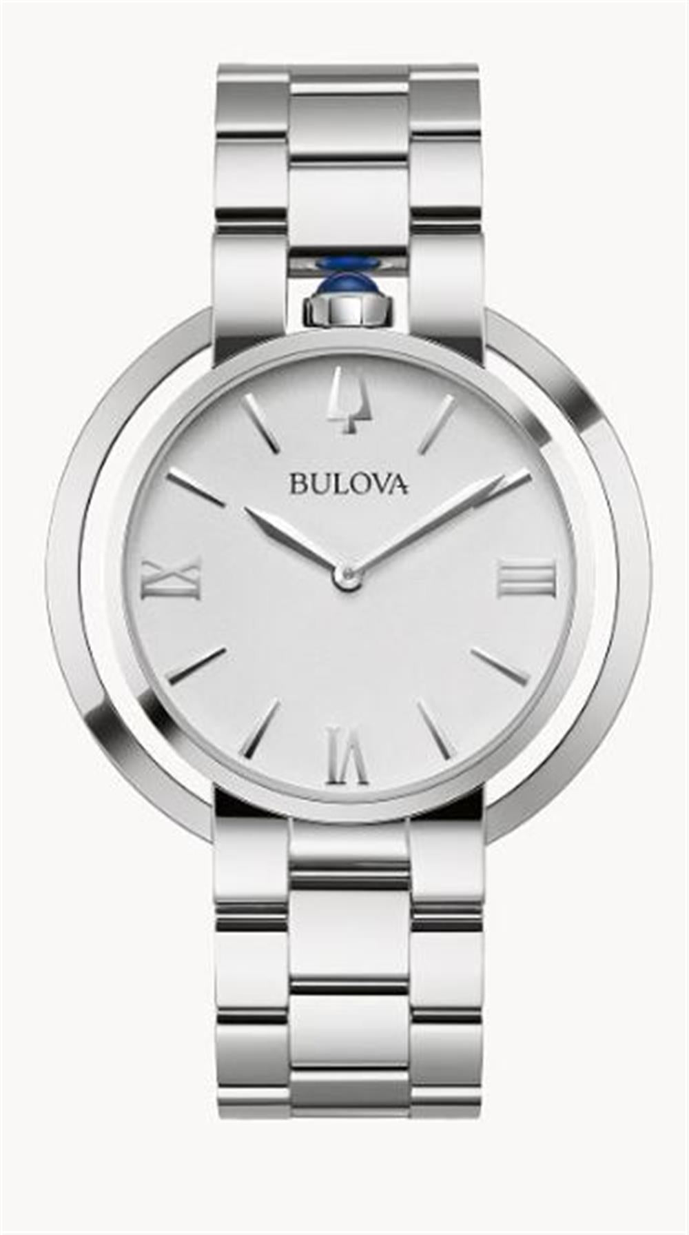 The elegant Bulova Rubaiyat Women's Watch with Mother-of-Pearl Dial and Diamond Accents, crafted by the Bulova Watch Company, features a sleek silver finish. Its round face showcases a minimalist design with Roman numeral hour markers at the 12, 3, 6, and 9 o'clock positions. Simple lines mark other hours, and diamond accents add a touch of sophistication. The watch also boasts a metal link band and a striking blue accent on the crown.