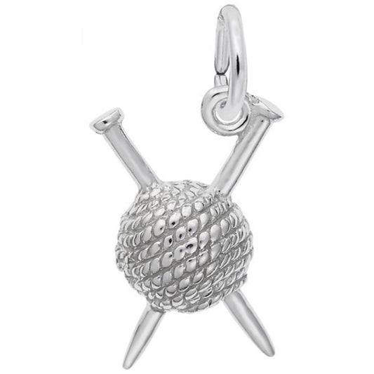 Presenting the Rembrandt Charms Knitting Charm in sterling silver: a beautiful charm designed to resemble a ball of yarn with two crossing knitting needles. This meticulously crafted piece features intricate details that mimic the texture of yarn and includes a small loop at the top for easy attachment to any chain, making it an ideal gift for any knitting enthusiast.