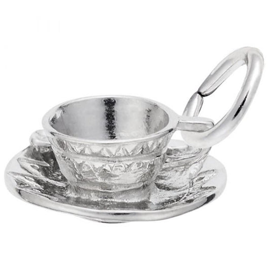 The Cup & Saucer Charm in Sterling Silver by Rembrandt Charms showcases a teacup and saucer design, complete with an attached loop for easy attachment to a chain or bracelet. Both the cup and saucer feature intricate engraved patterns, making it a charming addition to any collection.