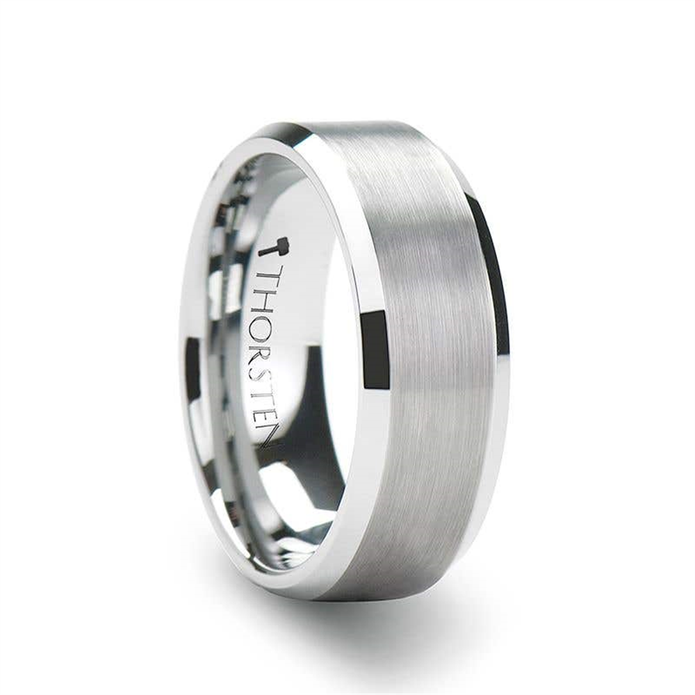 The Sheffield Flat Beveled Edges Tungsten Ring by Thorsten features a 6mm width with a brushed finish and smooth, polished edges. The name "Thorsten" is engraved on the inner band, giving this ring a modern and sleek design.