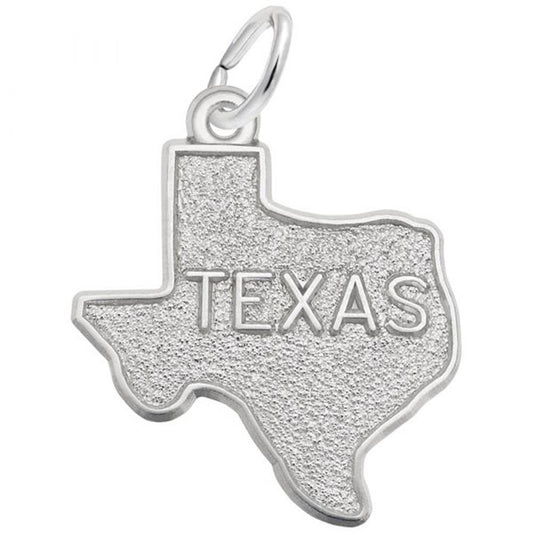 The Rembrandt Charms Texas Charm is a sterling silver pendant shaped like the state of Texas, featuring the word "TEXAS" engraved in the center. This elegant charm includes a small loop at the top, making it perfect for attaching to a necklace or keychain.