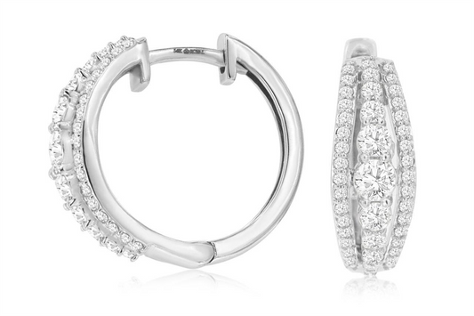 Two sophisticated 14k white gold hoop earrings from Royal Jewelry (Style # WH3350D) feature three rows of dazzling diamonds weighing a total of 0.90 carats. One earring is depicted from the side, highlighting its circular design, while the other showcases a front view with its exquisite diamond detailing.