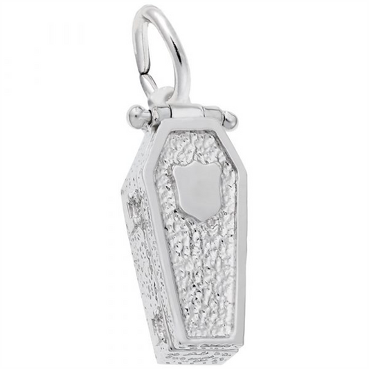 The Coffin Charm by Rembrandt Charms is a sterling silver pendant featuring a textured surface and a small shield emblem on the front. It includes a loop at the top for attaching to a chain or bracelet.