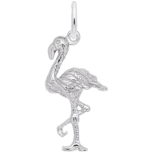 The Flamingo Charm in Sterling Silver by Rembrandt Charms features detailed feather engravings and one leg raised in a classic flamingo pose, attached to a small loop for wearing as a necklace charm, showcasing the brand's exquisite craftsmanship.