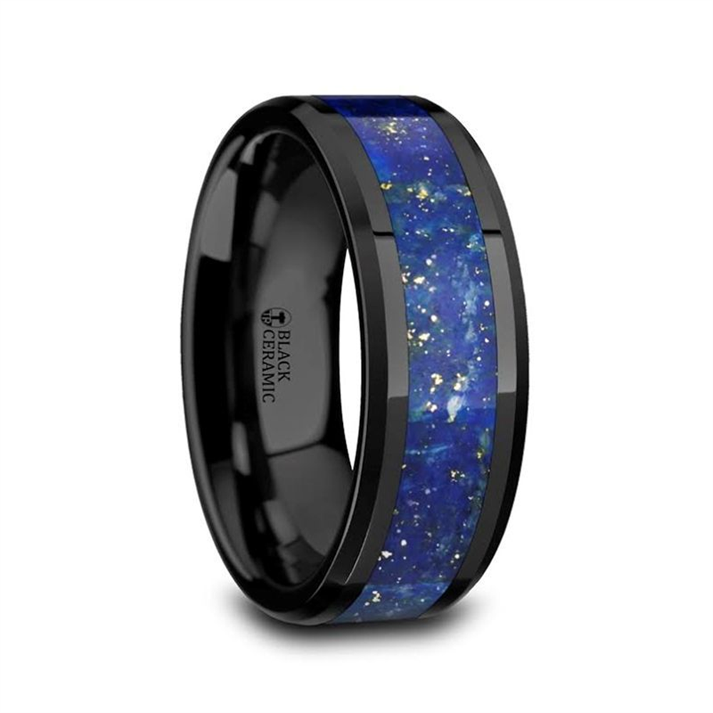 The MARLOW men's wedding band by Thorsten boasts a polished black ceramic design with an 8mm width, featuring a striking blue lapis inlay with gold flakes that runs around the center of the ring. Its sleek and stylish look makes it perfect for any modern groom.