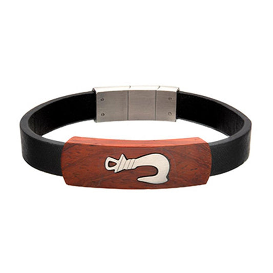 The INOX Men's Stainless Steel Black Leather Bracelet features a red wooden plate with an engraved silver fish hook design. Equipped with a metallic clasp, this wristband offers both style and security.