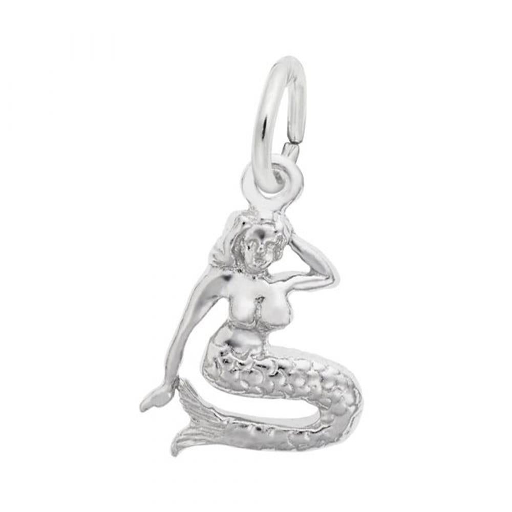 The Mermaid Charm / Sterling Silver by Rembrandt Charms features intricate detailing, depicting a mermaid with long flowing hair and a partially raised arm, sitting on her fishtail. The charm includes a loop at the top for easy attachment to a necklace or bracelet.