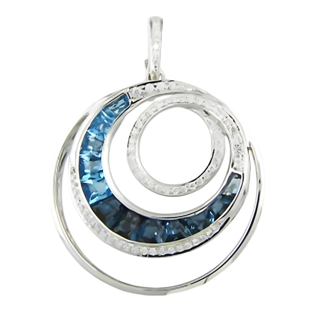 A silver pendant from Bellarri's Blue Topaz and Diamond Pearl Enhancer collection features an elegant spiral design. The spiral includes segments inlaid with shimmering blue topaz gemstones. The intricate metalwork adds a sophisticated touch to the modern and stylish accessory.