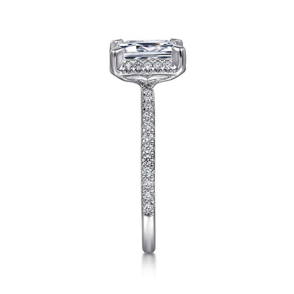 Side view of the 14K White Gold Diamond Engagement Ring from Gabriel & Co's Classic Collection, featuring a rectangular diamond. The band is crafted in 14K white gold and embellished with small diamonds, creating an elegant and sparkling design that prominently showcases the diamond.