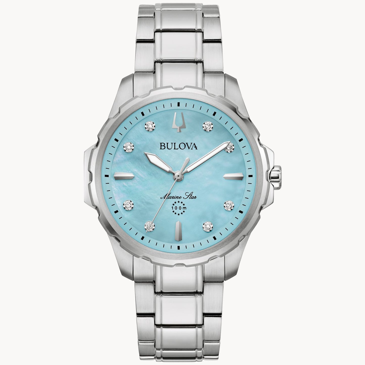 The Bulova Watch Company's Marine Star Ladies' Watch with Mother of Pearl and Diamonds is displayed. This silver timepiece features a striking blue mother-of-pearl dial adorned with diamond hour markers. It is complemented by a stainless steel link bracelet and offers water resistance up to 100 meters. The Bulova brand name is elegantly positioned below the 12 o'clock marker.