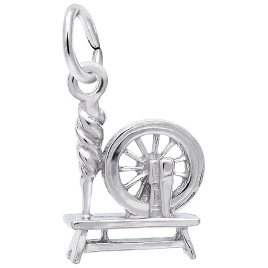 The Rembrandt Charms Spinning Wheel Charm in sterling silver showcases intricate detailing, including a wheel, spindle, and a loop at the top for easy attachment to a bracelet or necklace. This charm features a shiny, polished finish and boasts a vintage design.