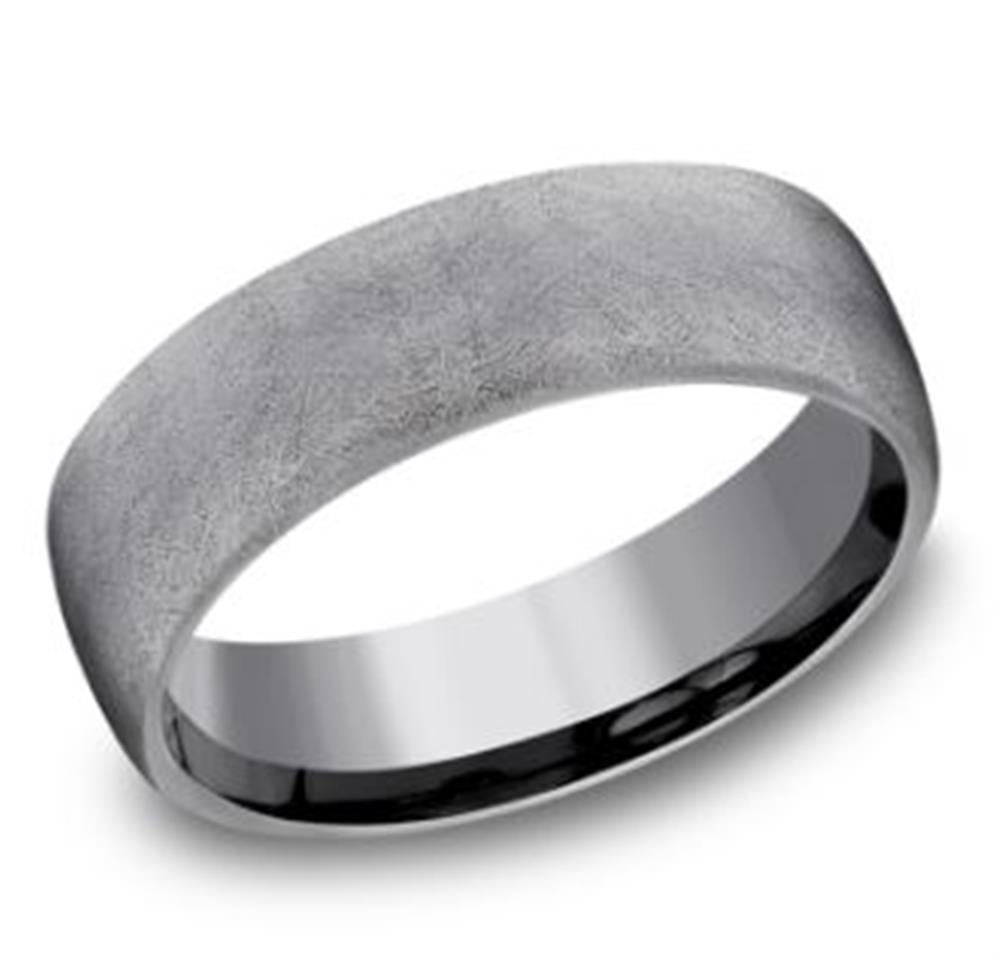 The 6mm Tantalum with Swirl Finish Ring by Benchmark Rings features a simple, wide design with a brushed silver exterior and a polished, shiny interior. This minimalistic men's ring also has a slight curvature, softly reflecting light.