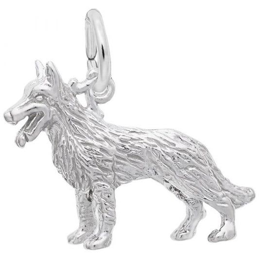 The Rembrandt Charms German Shepherd Dog Charm in sterling silver features a detailed fur texture and stands on all fours. Its mouth is open, and its head is adorned with a small loop for attaching to a chain or bracelet, capturing a majestic and strong appearance reminiscent of a noble German Shepherd.