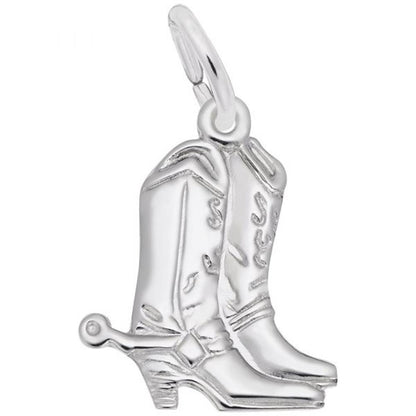 Introducing the Cowboy Boots Charm in Sterling Silver by Rembrandt Charms: a beautifully crafted piece featuring intricate decorative engravings and spurs. Complete with a small loop for hanging, this exquisite charm is perfect for anyone who loves western-themed jewelry.