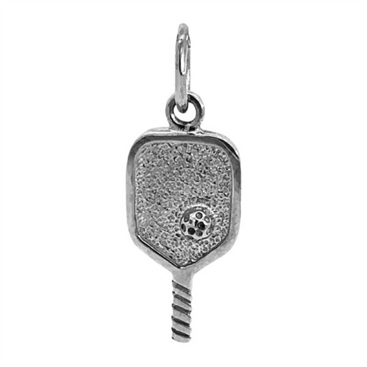 The Rembrandt Charms Pickleball Paddle Charm in sterling silver is shaped like a pickleball paddle and features a small pickleball design on its textured surface. Perfect for any pickleball enthusiast, this charm includes a loop at the top for easy attachment to a chain or bracelet.