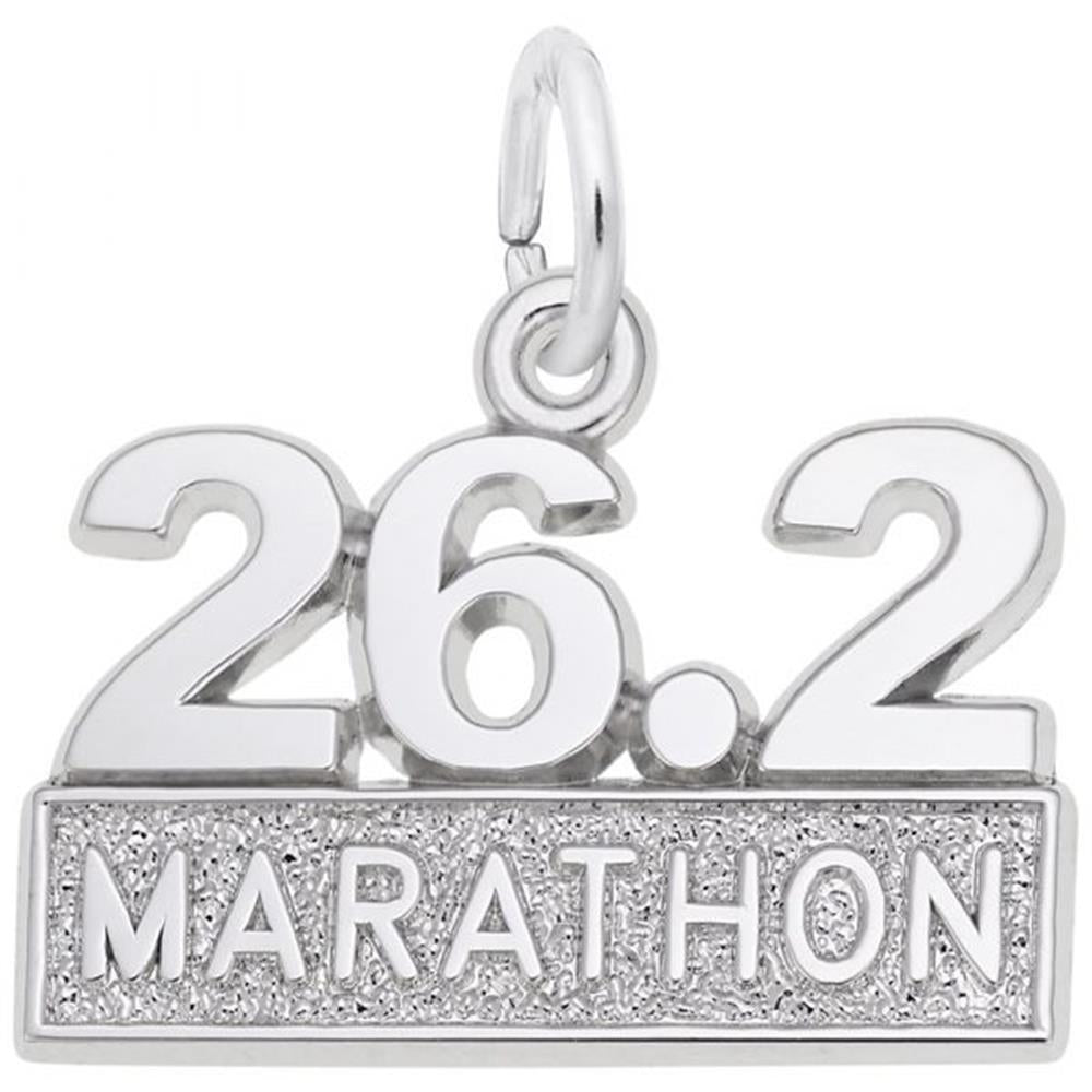 Introducing the Marathon Charm in sterling silver by Rembrandt Charms: This rectangular charm features the engraved "26.2" on top, followed by the word "MARATHON" in bold lettering below. It includes a circular ring for easy attachment or wearing, while boasting a shimmery textured surface at the bottom that exemplifies Rembrandt Charms' meticulous craftsmanship.