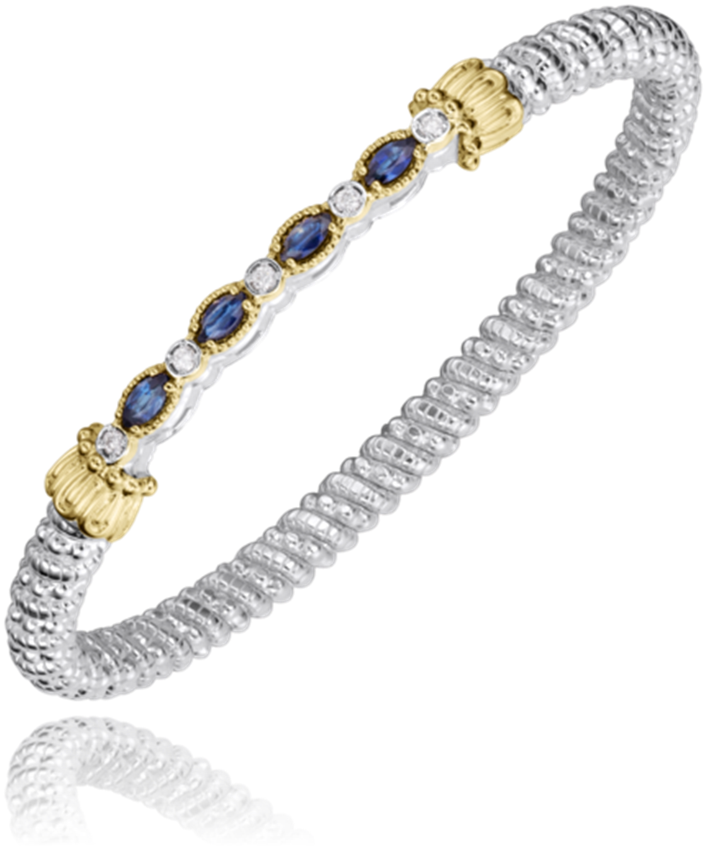 A stunning Alwand Vahan Jewelry piece, this textured silver bracelet is adorned with alternating 4mm sapphires and clear oval gemstones set in gold, complete with decorative gold ends.