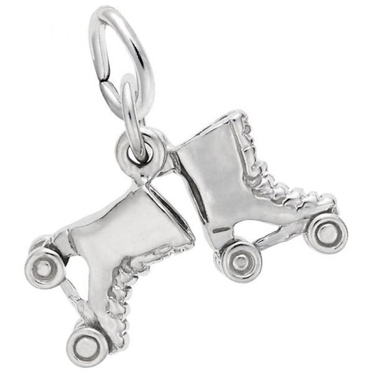 The Roller Skates Charm from Rembrandt Charms is crafted from Sterling Silver and showcases two skates crossed at the toes, complete with intricate laces and four wheels on each skate. This charm also features a small loop at the top for easy attachment to a bracelet or necklace.