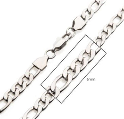 A close-up image of the INOX 6mm Steel Figaro Chain, a men's necklace with flat rectangular links. The stainless steel chain, highlighted by a box to indicate its 6mm width, features a lobster claw clasp at the top.