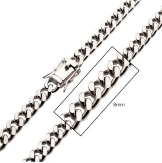 A close-up of the 20-inch "8mm Steel Miami Cuban Chain" by INOX highlights its lobster clasp and a measuring box showcasing the chain's 8mm width. This men's necklace features rounded, evenly spaced stainless steel links with a polished, reflective surface.