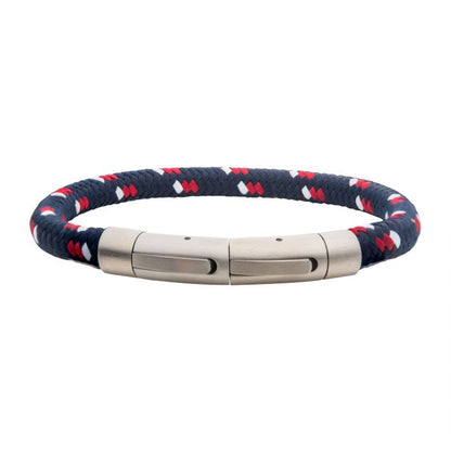 The INOX 6mm Blue, White and Red Nylon Cord Bracelet features an elegant braided navy blue strap with red and white accents, and is equipped with a sophisticated brushed tubular press clasp. The bracelet measures between 8-8.5 inches in length.