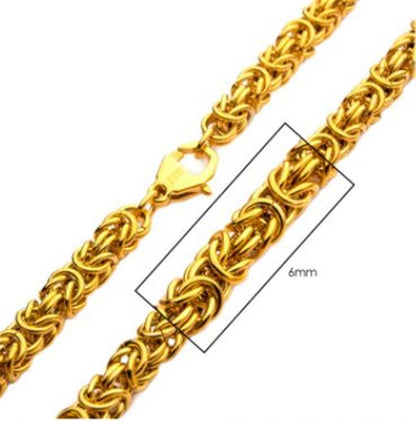 A close-up image of the INOX 6mm 18K Gold Plated King Byzantine Chain for men, showcasing its intricate, interwoven links and gold accents. The chain, equipped with a lobster clasp, is highlighted in a rectangular box with the 6mm measurement indicated.