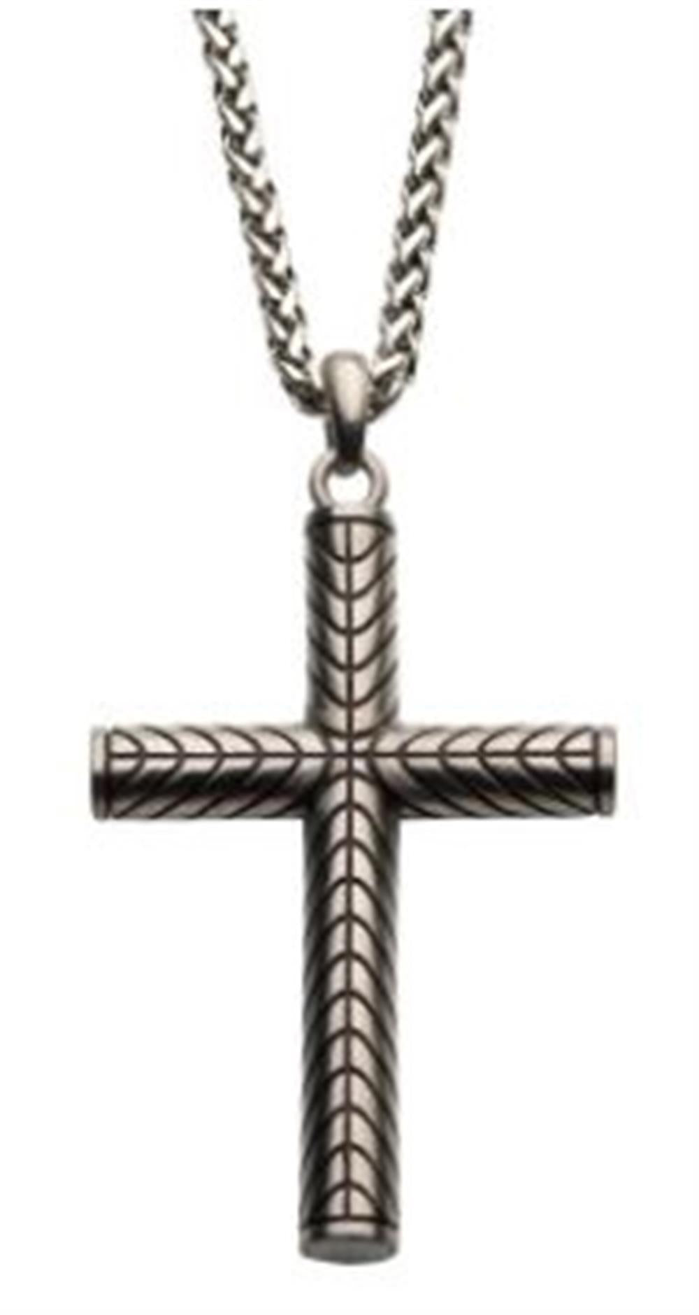 The Steel Geometric Pattern Cross Pendant with Steel Wheat Chain by INOX features an ornate cylindrical design adorned with intricate geometric patterns, hanging from a thick steel wheat chain. The cross boasts a modern, metallic finish.