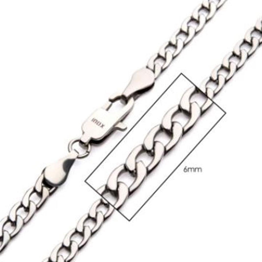 Close-up image of the INOX 6mm Steel Classic Curb Chain necklace with a lobster clasp. The curb chain links, perfect for men's jewelry, are measured to be 6mm in width, indicated by an annotated box with the numeric measurement "6mm" written next to it.