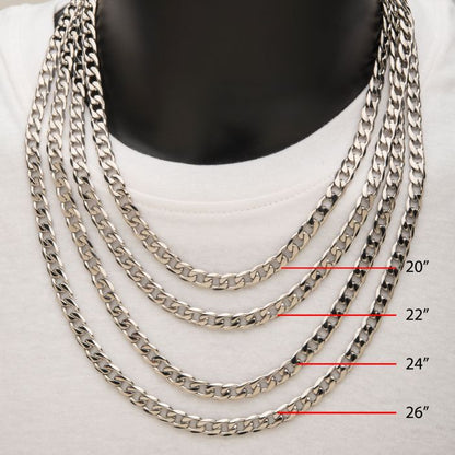 A display of silver men's necklaces in stainless steel chain designs, including the 8mm Steel Bevel Curb Chain by INOX, draped around a mannequin's neck on a white shirt. The chains are labeled with red lines indicating their lengths: 20 inches, 22 inches, 24 inches, and 26 inches from top to bottom.